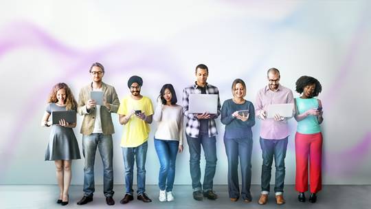 group of college students stading with laptop in hand using the learning apps for students